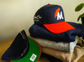 Metri Feather logo Snapback (Navy/Orange)